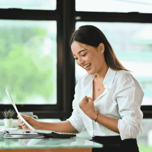 woman celebrating healthy business growth